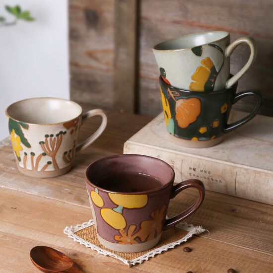 Vintage hand-painted rustic ceramic floral mug with underglaze color