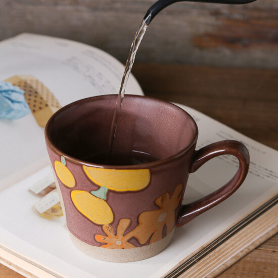 Vintage hand-painted rustic ceramic floral mug with underglaze color