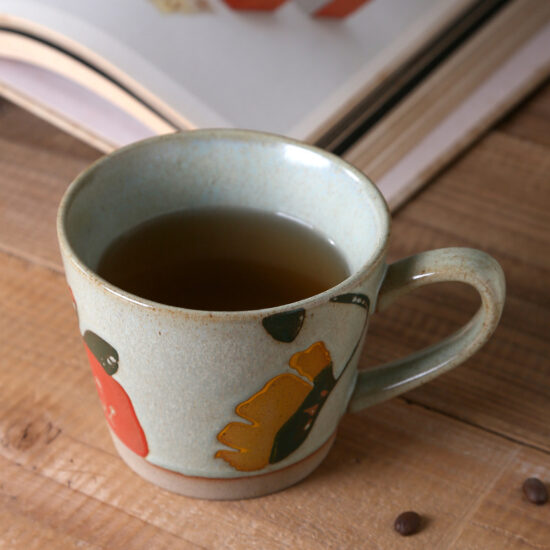 Vintage hand-painted rustic ceramic floral mug with underglaze color