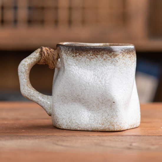 Rustic Japanese-style ceramic tea cup and saucer set