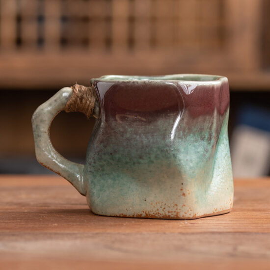 Rustic Japanese-style ceramic tea cup and saucer set