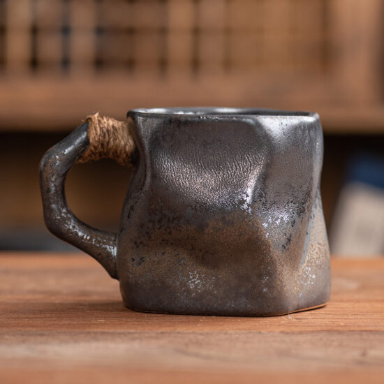 Rustic Japanese-style ceramic tea cup and saucer set