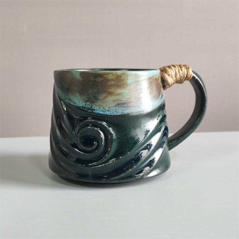 Unique irregular ceramic coffee mug with kiln-glazed surface