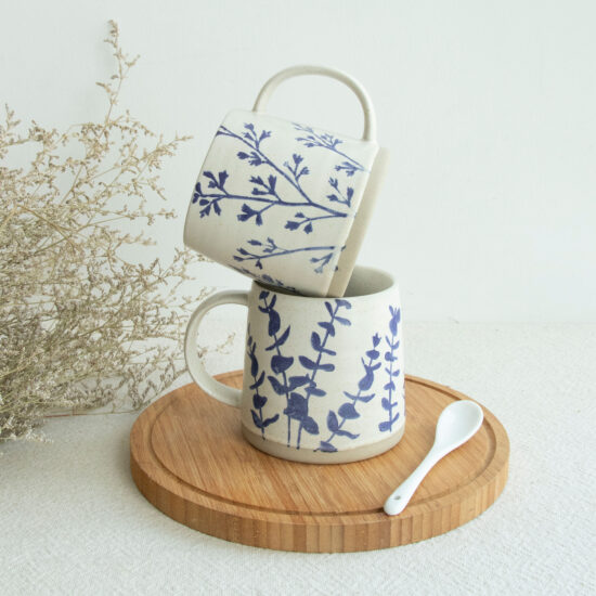 Hand-Painted White Ceramic Mug with Artistic Design