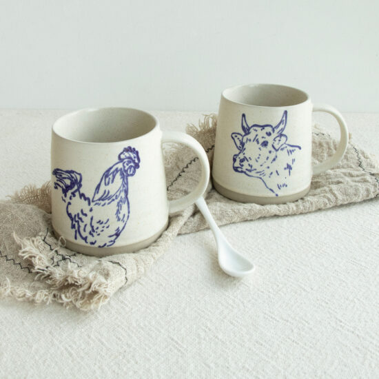 Hand-Painted White Ceramic Mug with Artistic Design