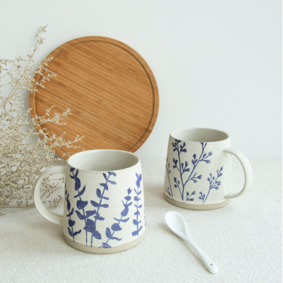 Hand-Painted White Ceramic Mug with Artistic Design