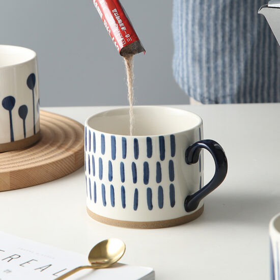 Hand-Painted White Ceramic Mug with Artistic Design