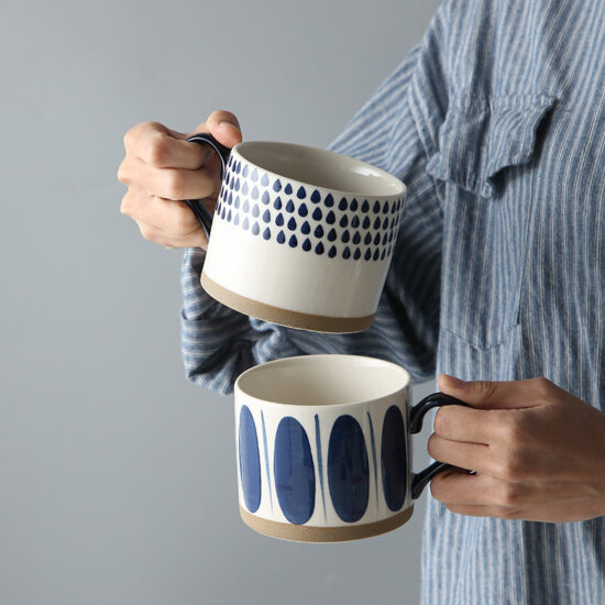 Hand-Painted White Ceramic Mug with Artistic Design