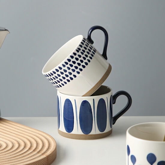 Hand-Painted White Ceramic Mug with Artistic Design