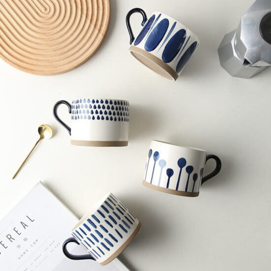 Hand-Painted White Ceramic Mug with Artistic Design