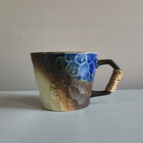 Kiln-glazed ceramic coffee mug with artistic finish