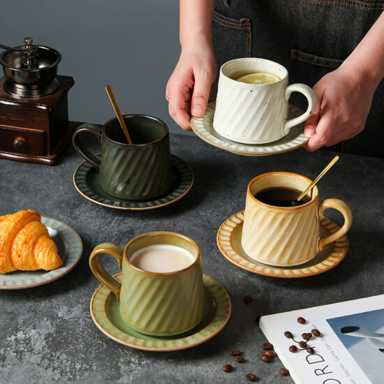 Vintage hand-painted striped ceramic mug and saucer set