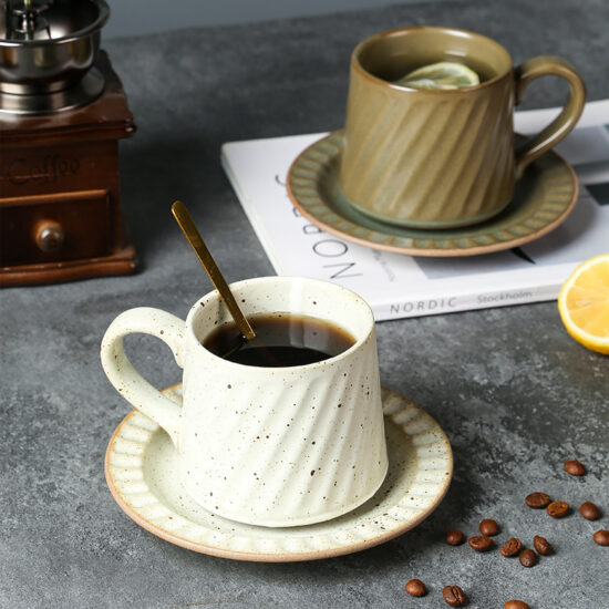 Vintage hand-painted striped ceramic mug and saucer set