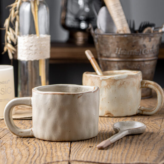 Handmade rustic ceramic milk cup with spoon, irregular shape coffee mug