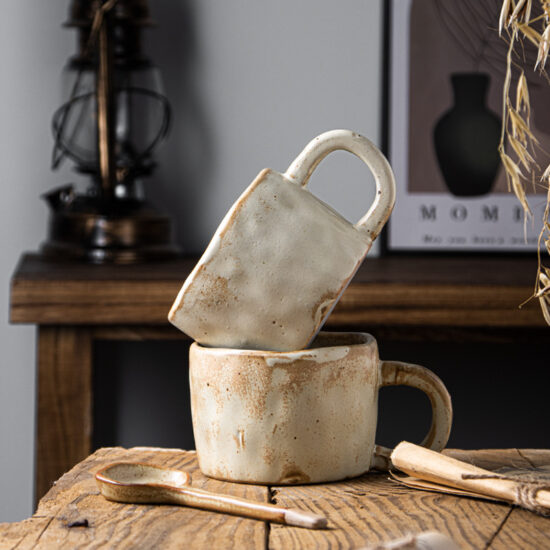Handmade rustic ceramic milk cup with spoon, irregular shape coffee mug