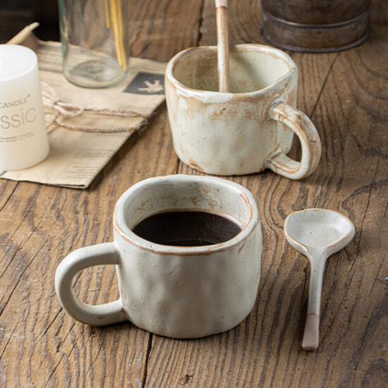 Handmade rustic ceramic milk cup with spoon, irregular shape coffee mug