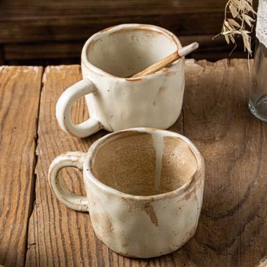 Handmade rustic ceramic milk cup with spoon, irregular shape coffee mug