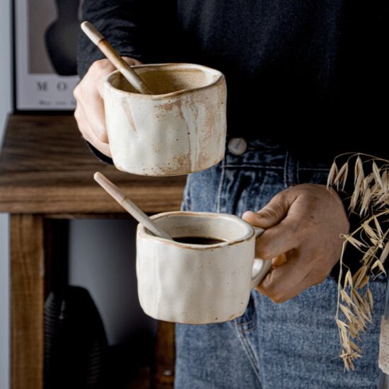 Handmade rustic ceramic milk cup with spoon, irregular shape coffee mug